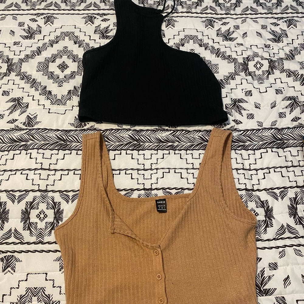 2 tank tops. Tan and black. Selling as a set.